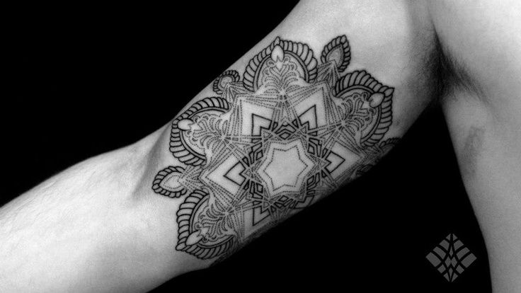 Geometrical arm tattoo by Brian Gomes