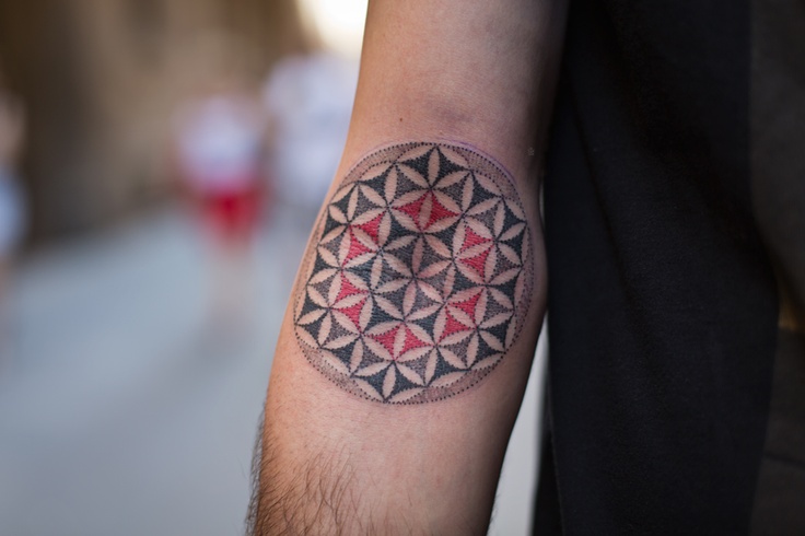 Geometrical arm tattoo by Pepe Vicio