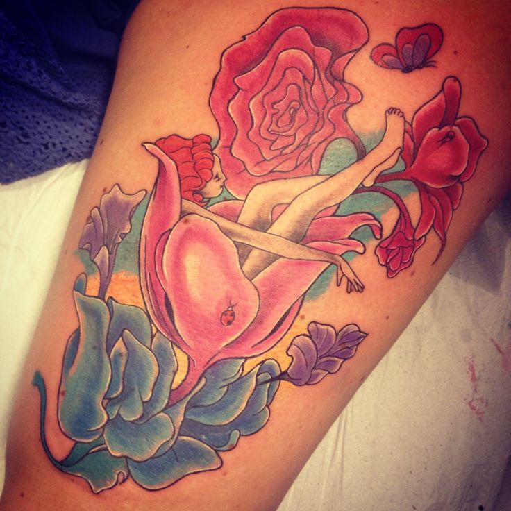 Girl inside flower tattoo