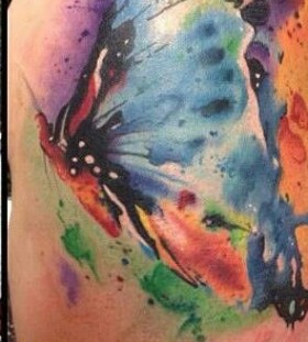 Girl's shoulder watercolor butterfly tattoo