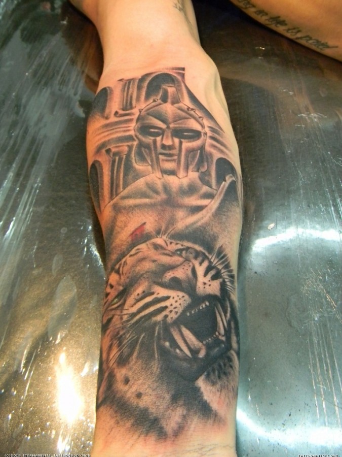 Gladiator and tiger tattoo