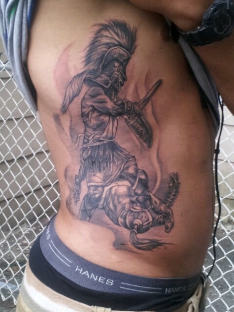 Gladiator fighting side tattoo