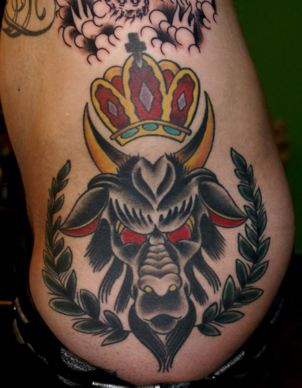 Goat and crown tattoo