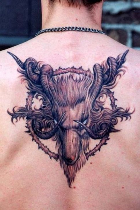 Goats’ head back tattoo