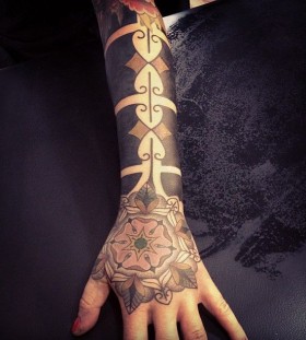 Gorgeous arm tattoo by Gerhard Wiesbeck