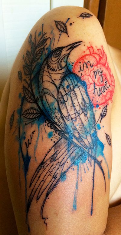 Gorgeous crow arm tattoo by Tyago Compiani