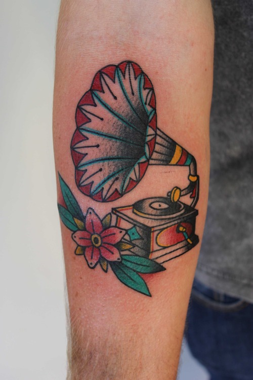 Gramophone and flower tattoo