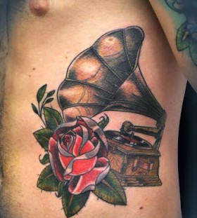 Gramophone and rose tattoo