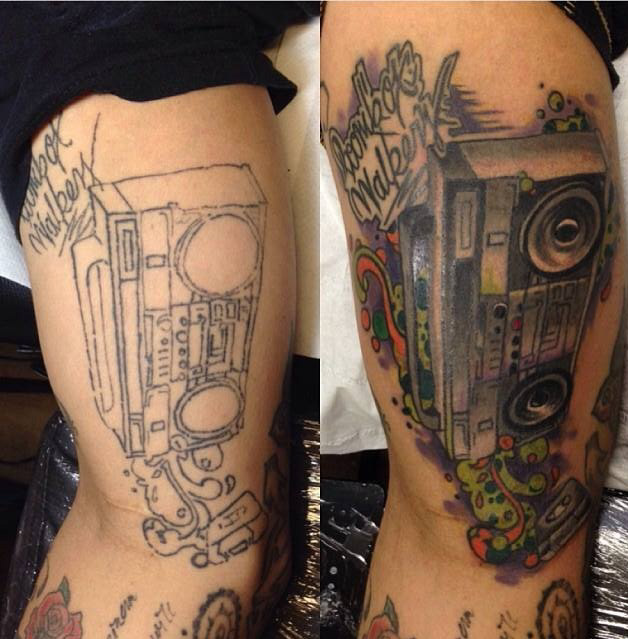 Great boombox leg tattoo
