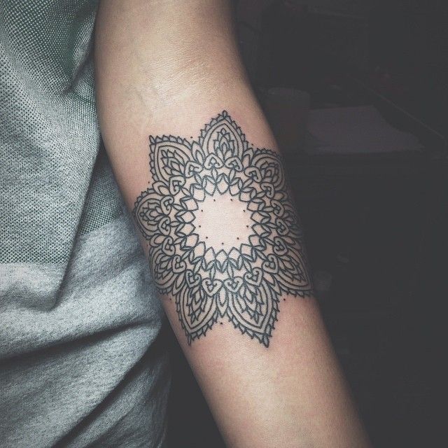 Great looking dot mandala tattoo
