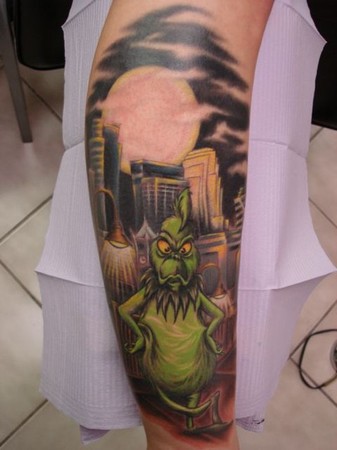 Great looking grinch christmas tattoo