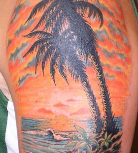 Great sunset and palm tree tattoo