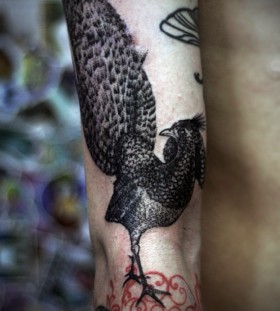 Grey ink pheasant tattoo