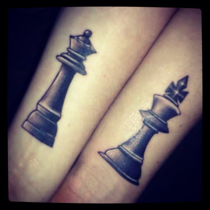Hand’s black chess tattoo