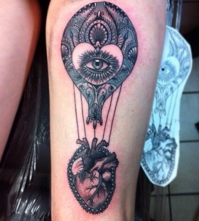 Heart and eye air balloon tattoo by Flo Nuttall