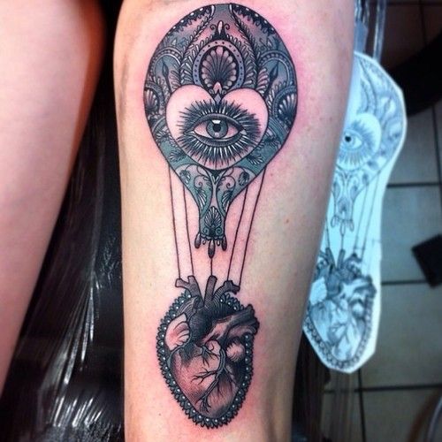 Heart and eye air balloon tattoo by Flo Nuttall