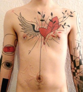 Heart and wings tattoo by Yann Black