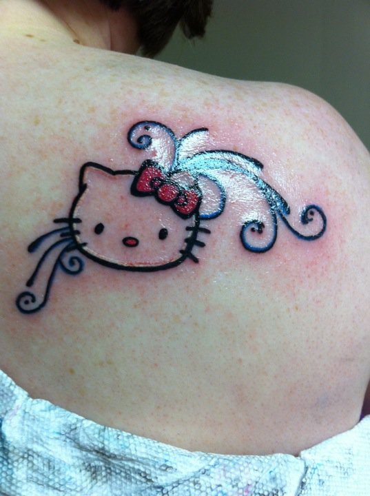 Hello kitty back tattoo