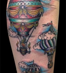 Hot air balloons arm tattoo