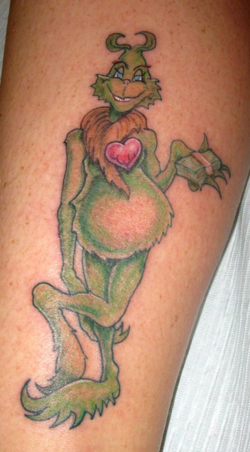Hot looking grinch christmas tattoo