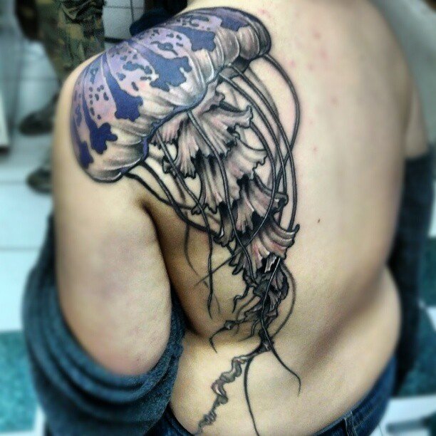 Huge jellyfish back tattoo