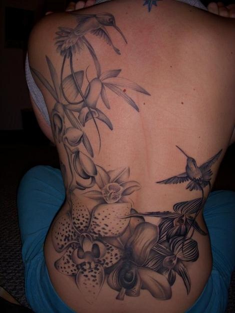 Hummingbirds and orchids tattoo by Amanda Leadman
