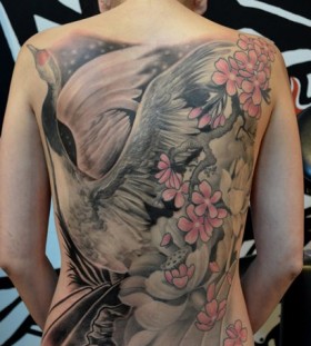 Incredible crane back tattoo
