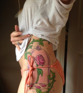 Incredible enhanted rose tattoo