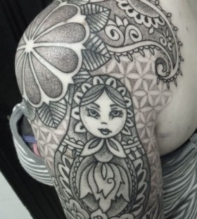 Incredible matryoshka arm tattoo