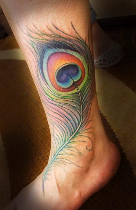 Incredible peacock feather ankle tattoo