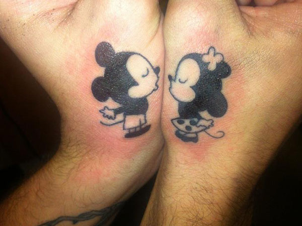 Kissing Minnie and Mickey tattoos