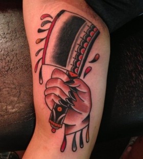 Knife in hand tattoo by Nick Oaks