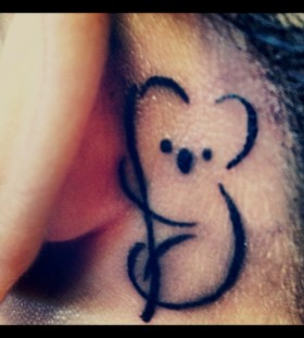 Koala bear under behind ear tattoo