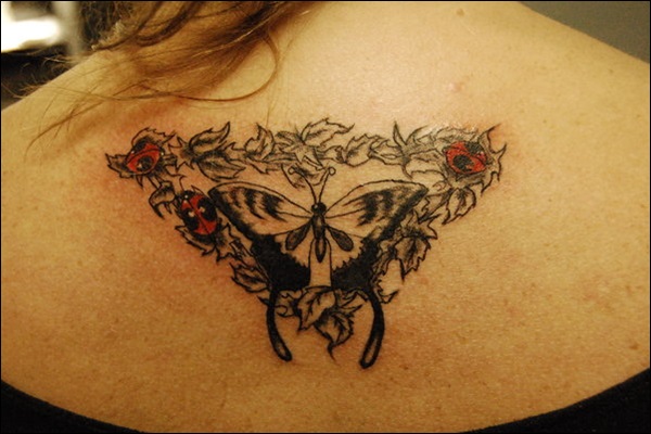 Ladybug and butterfly back tattoo