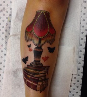 Lamp and butterflies tattoo by Drew Shallis