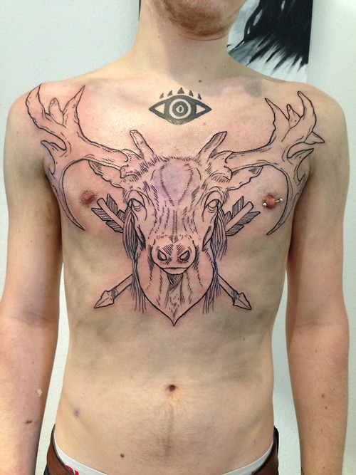 Large deer’s head chest tattoo