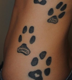 Large paws side tattoo