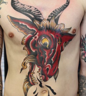 Large red goat head tattoo