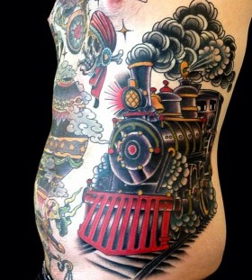 Large steaming train side tattoo