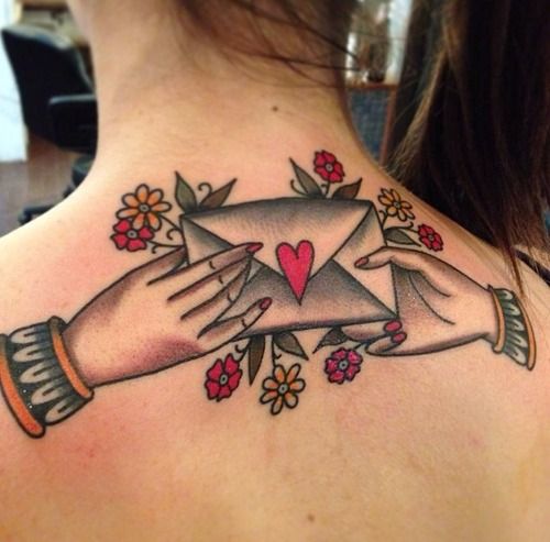 Letter and flowers back tattoo by Nick Oaks