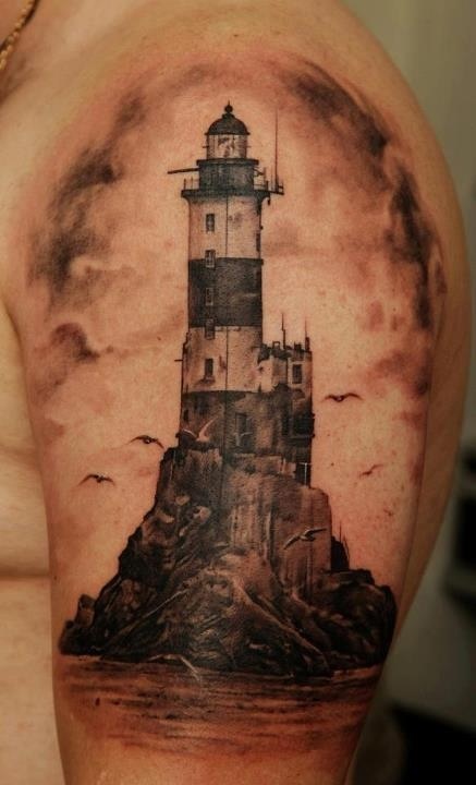 Lighthouse and birds tattoo