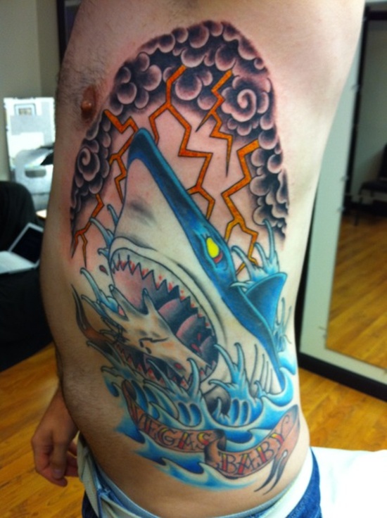 Lightning and shark tattoo