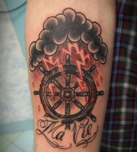 Lightning and wheel tattoo