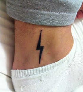 Lightning bolt ankle tattoo