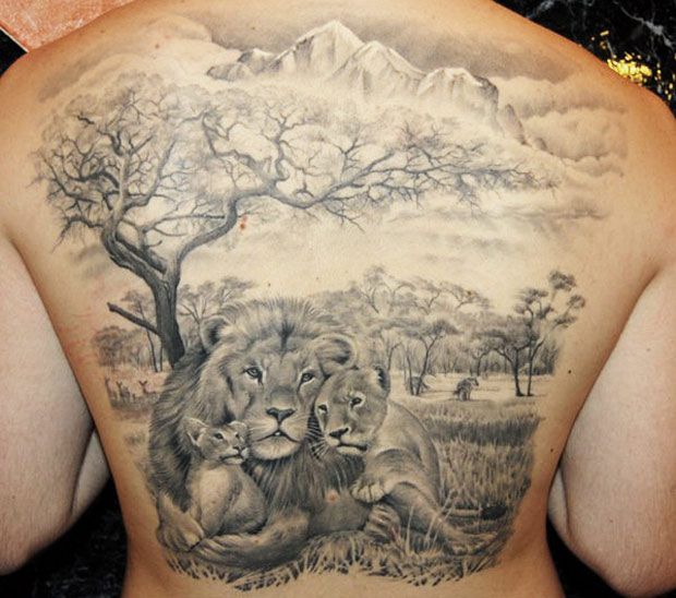 Lion family back tattoo by James Tattooart