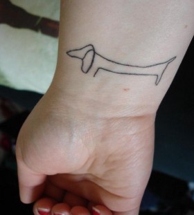 Long simple dog's tattoo