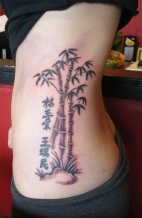 Lovely bamboo side tattoo