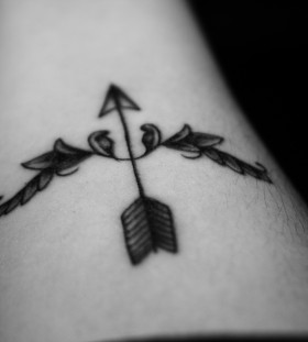 Lovely bow and arrow tattoo