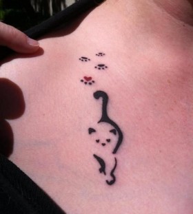 Lovely cat and paw tattoo