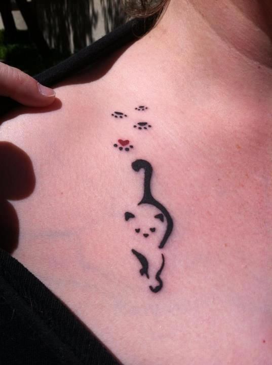 Lovely cat and paw tattoo